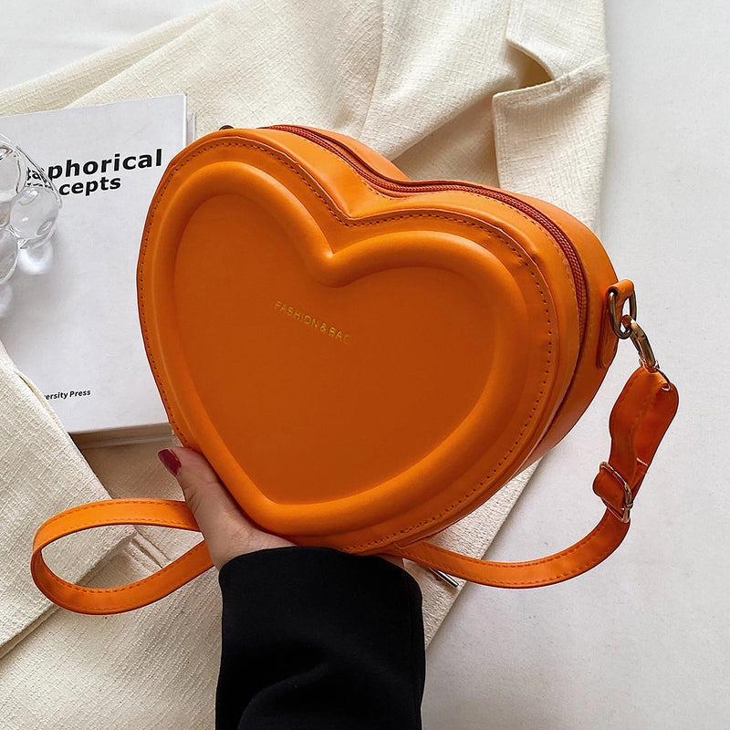 Women's Small Pu Leather Solid Color Fashion Heart-shaped Zipper Crossbody Bag