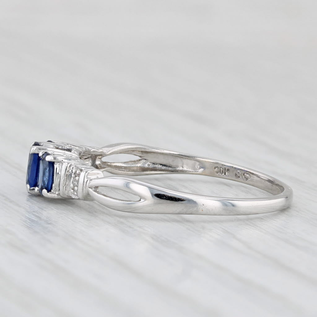 0.95ctw Lab Created Sapphire 3-Stone Ring 10k White Gold Size 9 Diamond Accents