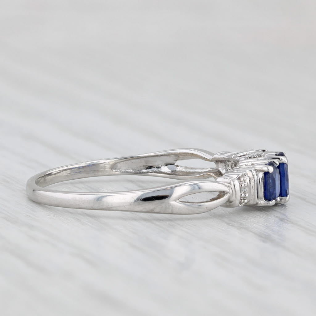 0.95ctw Lab Created Sapphire 3-Stone Ring 10k White Gold Size 9 Diamond Accents