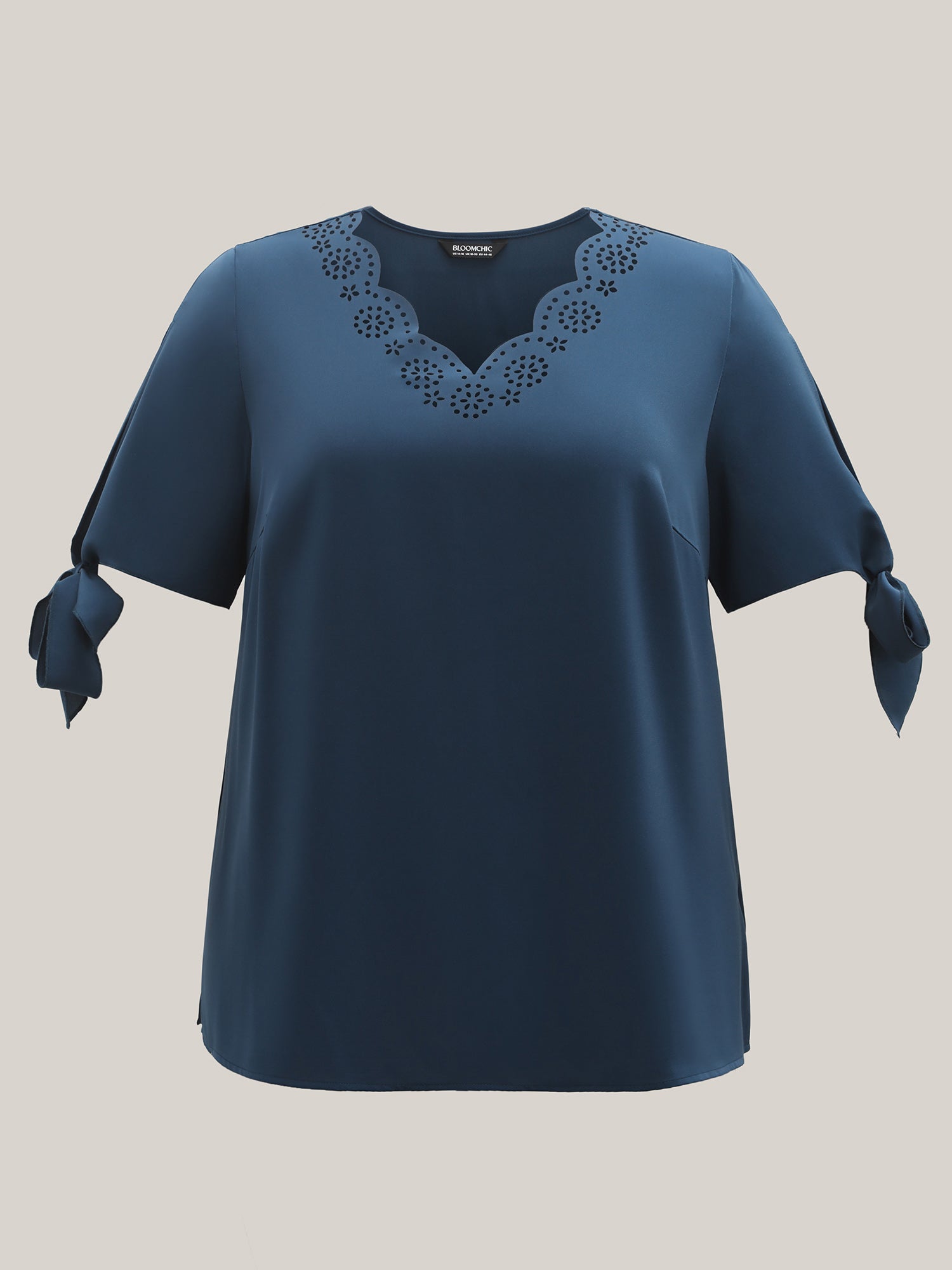 Laser Cut Neckline Knotted Sleeve Blouse