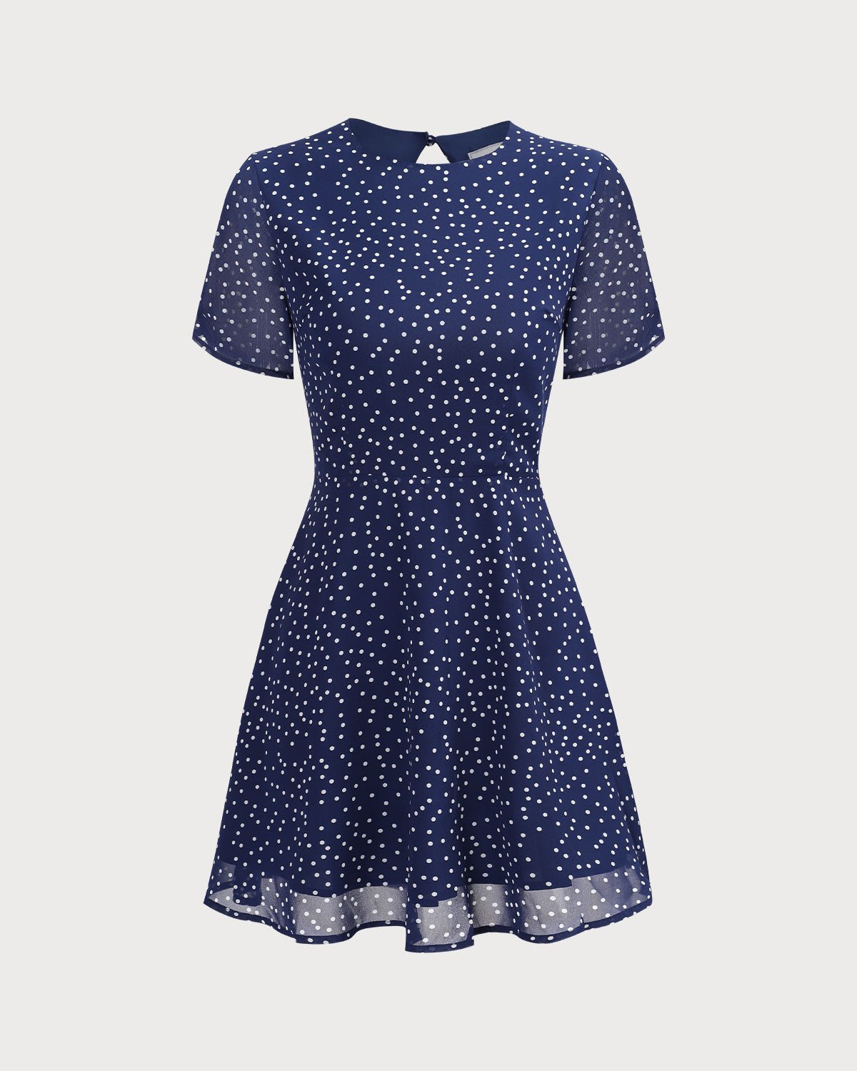 The Navy Crew Neck Polka Dot Cutout Mini Dress