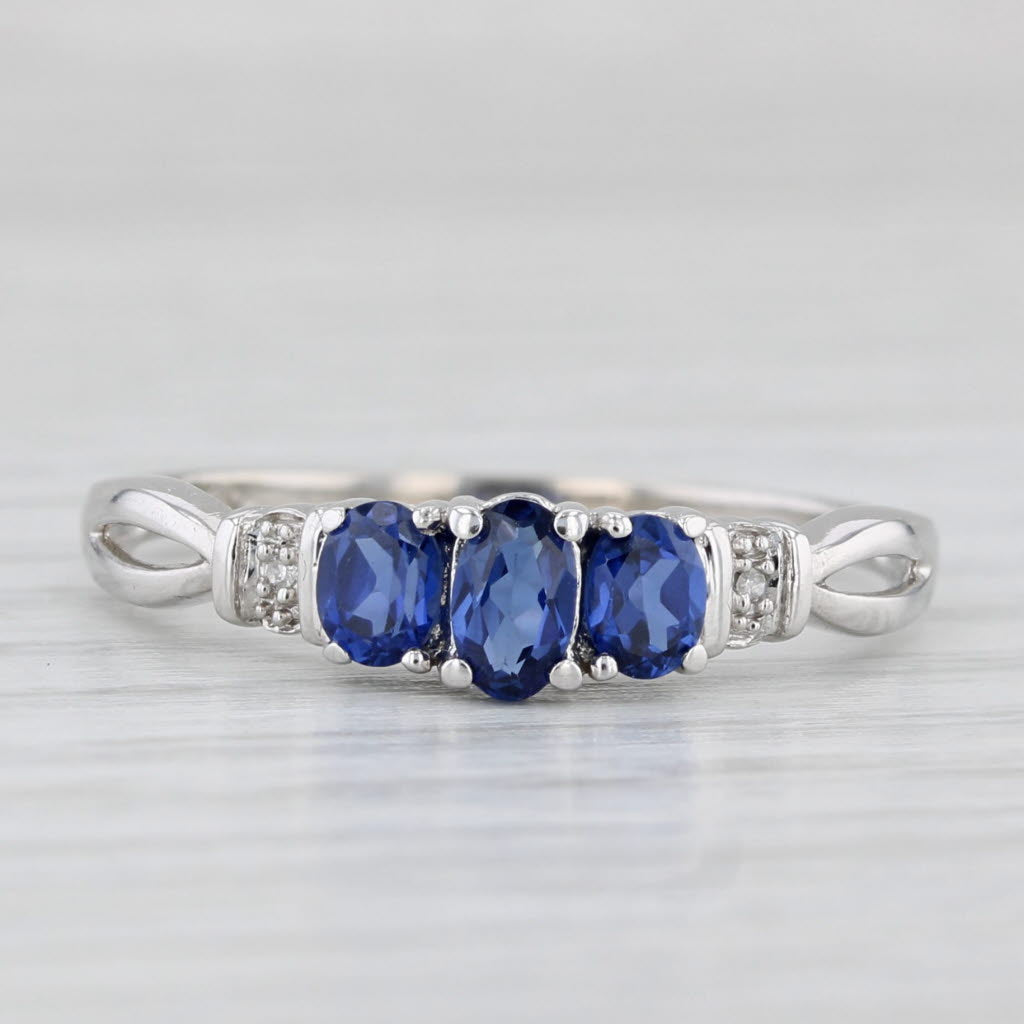 0.95ctw Lab Created Sapphire 3-Stone Ring 10k White Gold Size 9 Diamond Accents