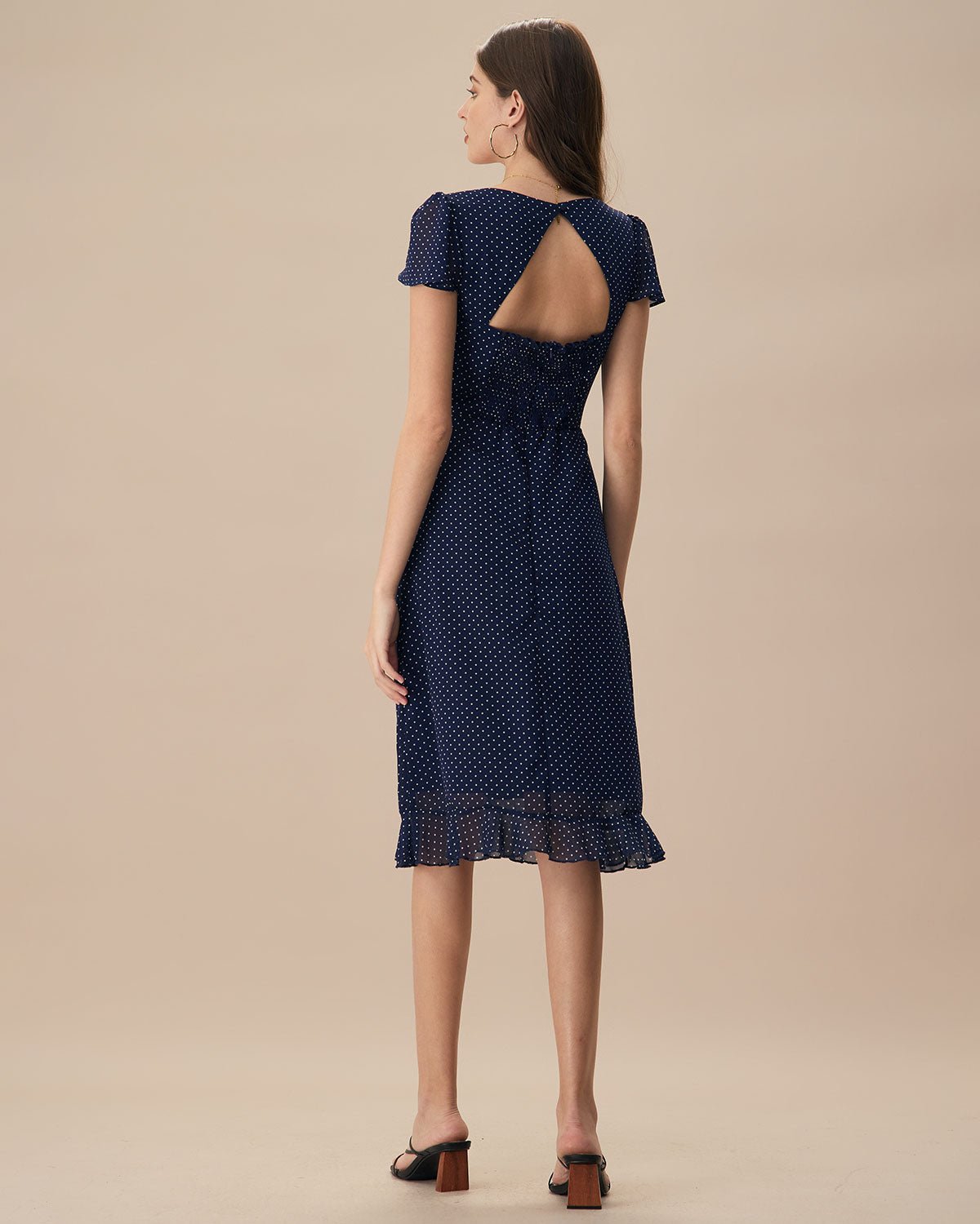 The Navy Polka Dot Cutout Midi Dress
