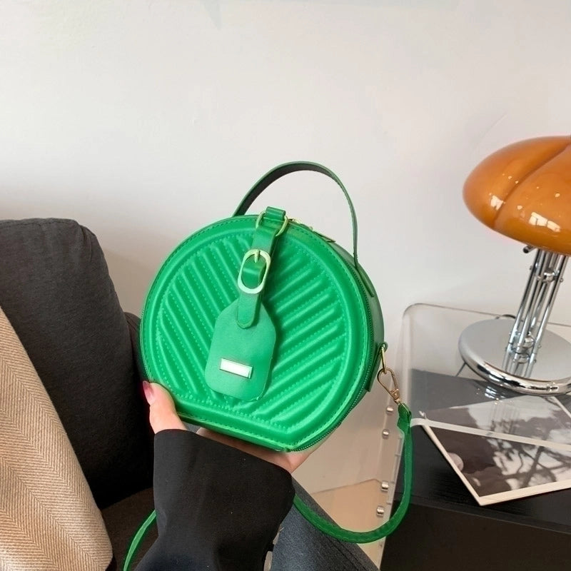 Women's Pu Leather Solid Color Elegant Round Zipper Handbag