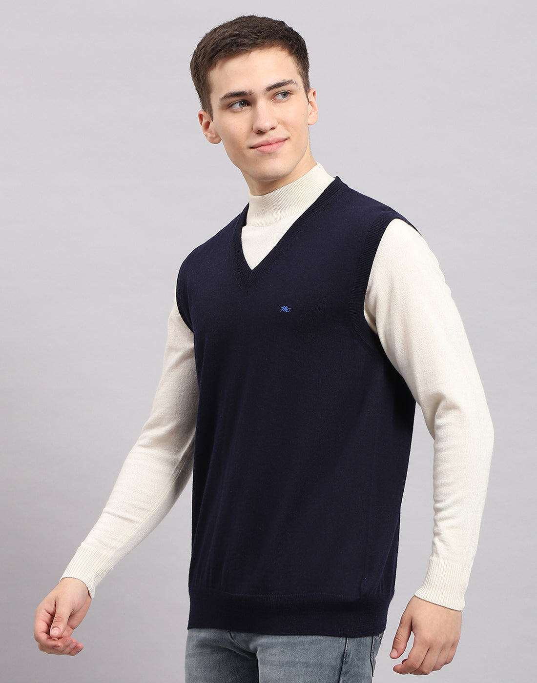 Men Navy Blue Solid V Neck Sleeveless Sweater