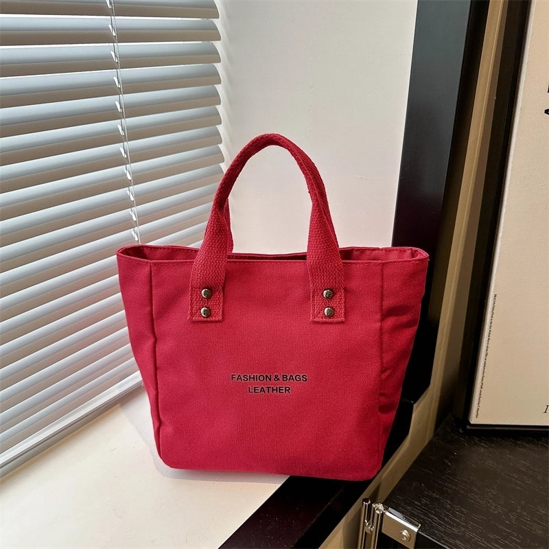 Women's Medium Canvas Letter Solid Color Basic Classic Style Zipper Handbag