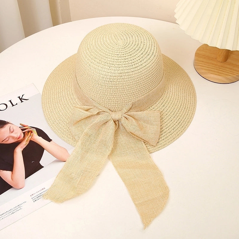 Women's Sweet Pastoral Solid Color Bowknot Wide Eaves Straw Hat