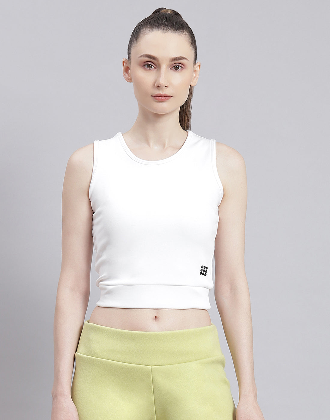 Women White Solid Round Neck Sleeveless Top