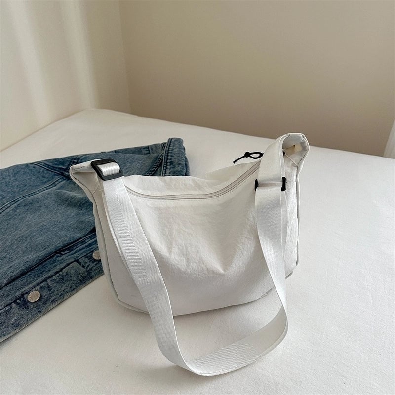 Women's Medium Canvas Solid Color Basic Classic Style Dumpling Shape Zipper Crossbody Bag