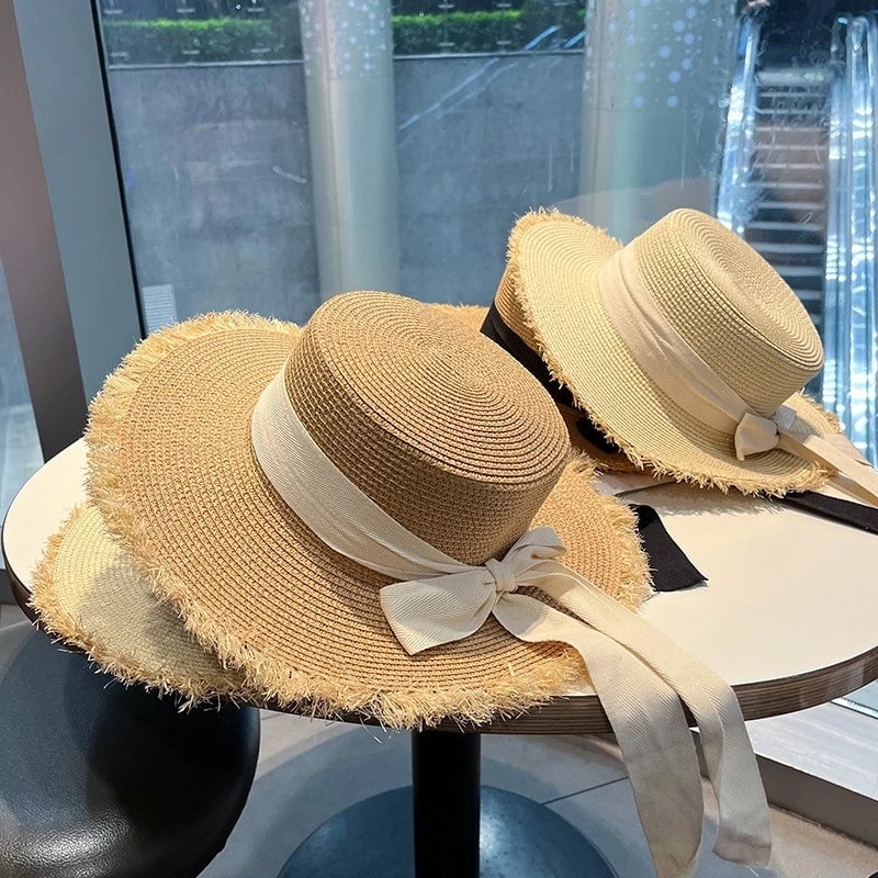 Women's Sweet Pastoral Solid Color Bowknot Wide Eaves Straw Hat