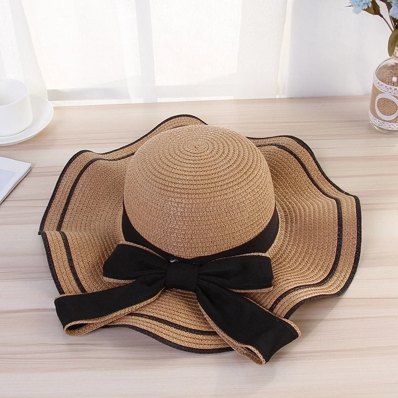 Women's Elegant Pastoral Minimalist Waves Bowknot Big Eaves Straw Hat