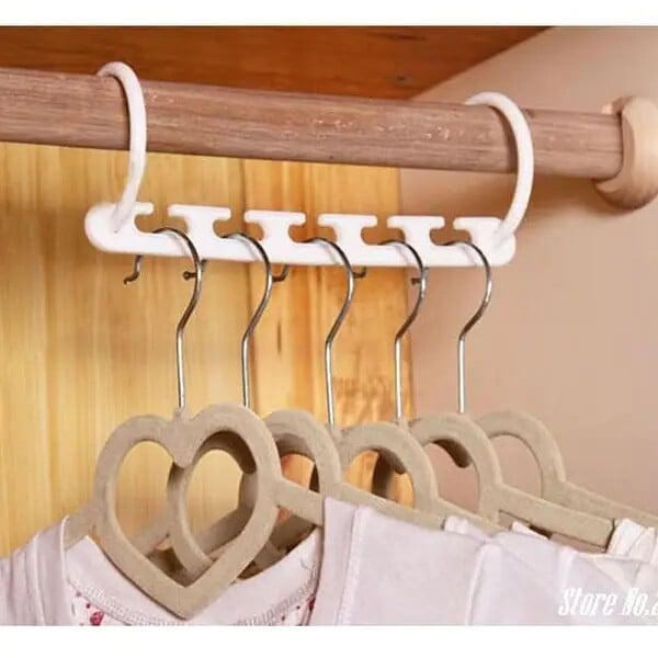 Rotatable folding plastic Wonder Hanger with multi-functional five hole