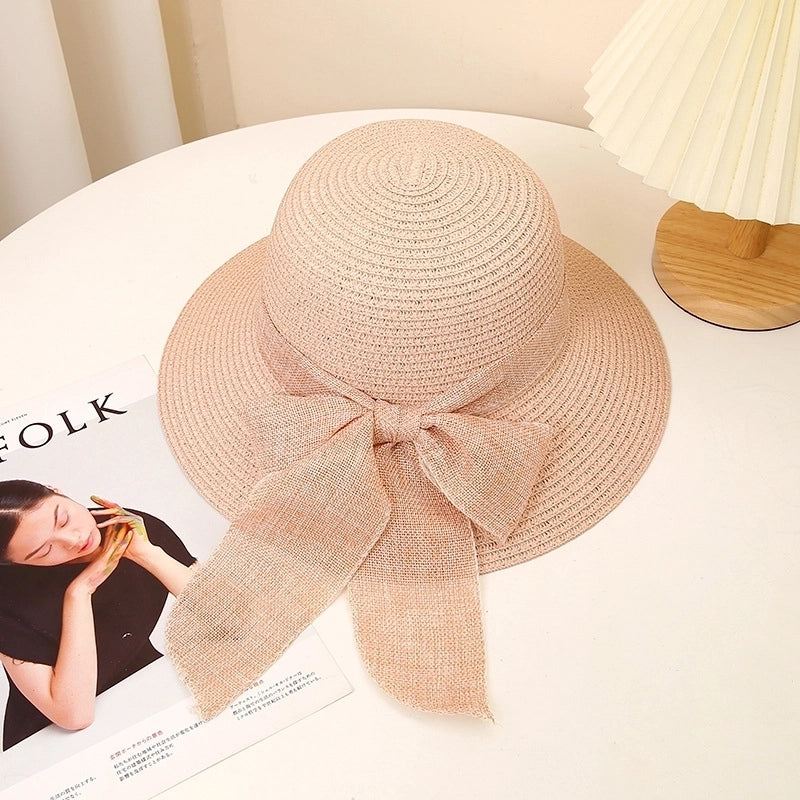 Women's Sweet Pastoral Solid Color Bowknot Wide Eaves Straw Hat