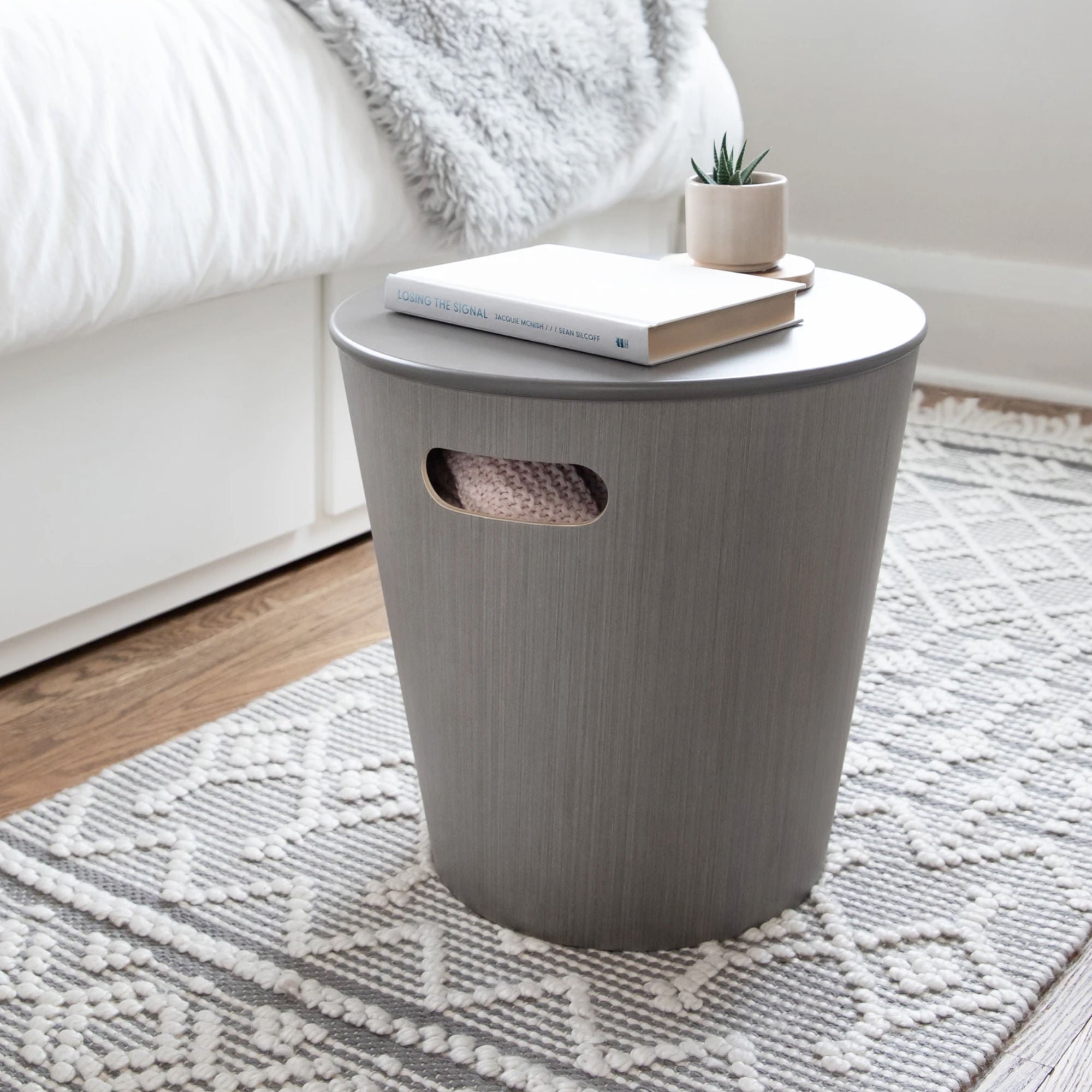 Umbra Woodrow storage stool. Grey
