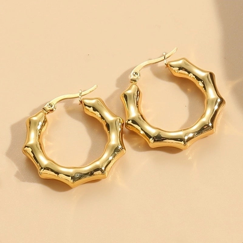 1 Pair Elegant Classic Style Stripe Oval Twist Hollow Out 304 Stainless Steel Earrings