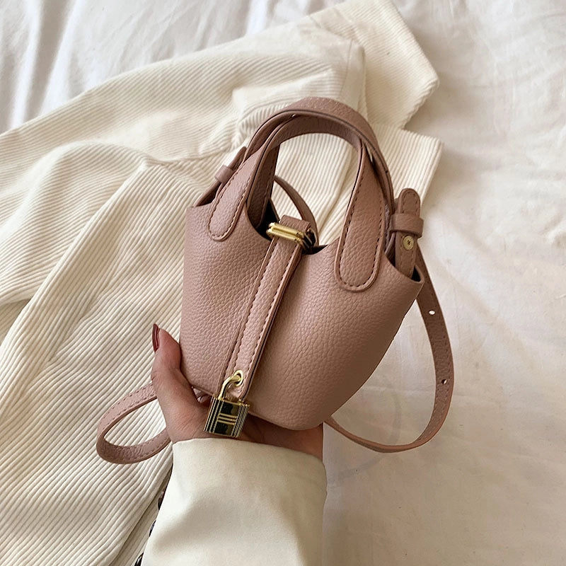 Women's Medium Pu Leather Solid Color Streetwear Bucket Lock Clasp Handbag Crossbody Bag