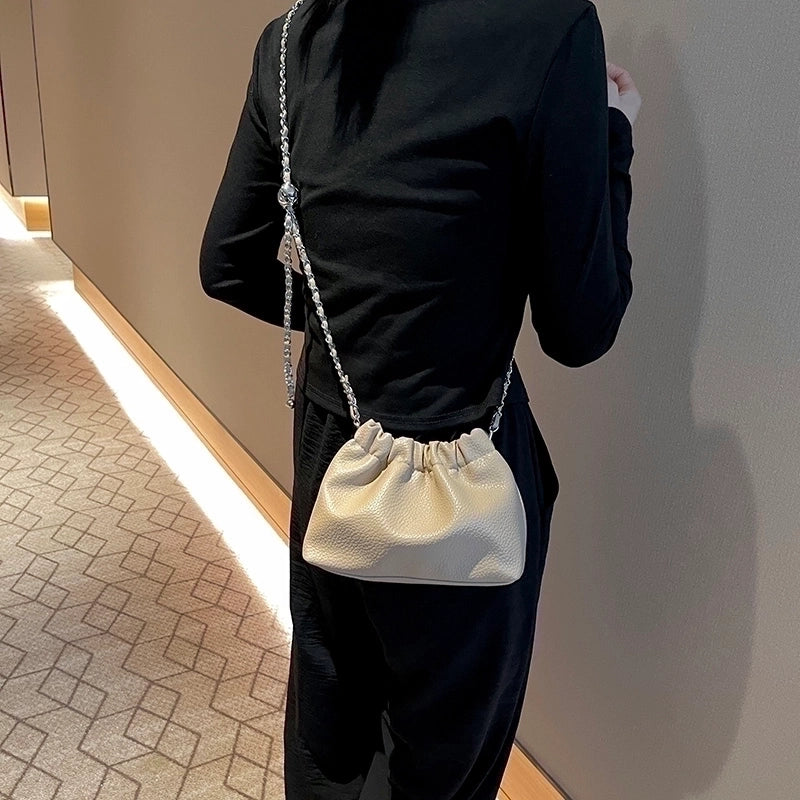 Women's Pu Solid Color Streetwear Sewing Thread Bucket Magnetic Buckle Crossbody Bag