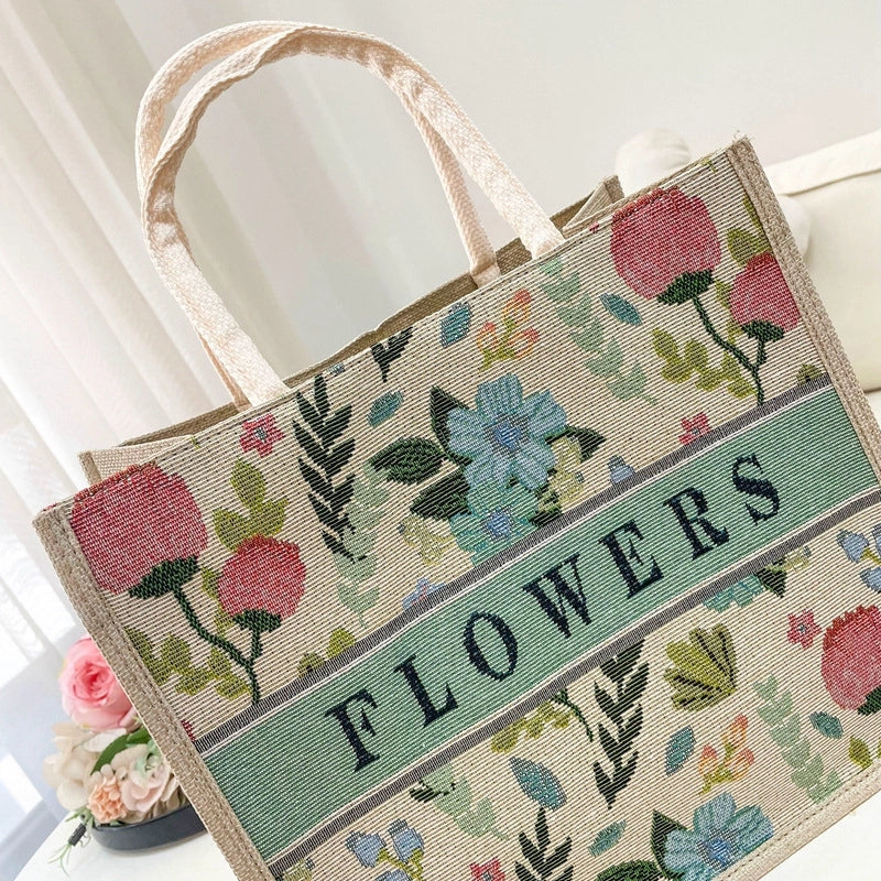 Women's Medium Cotton And Linen Letter Flower Streetwear Magnetic Buckle Tote Bag