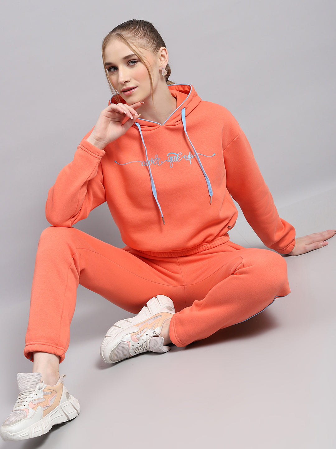 Women Peach Printed Hooded Full Sleeve Tracksuit