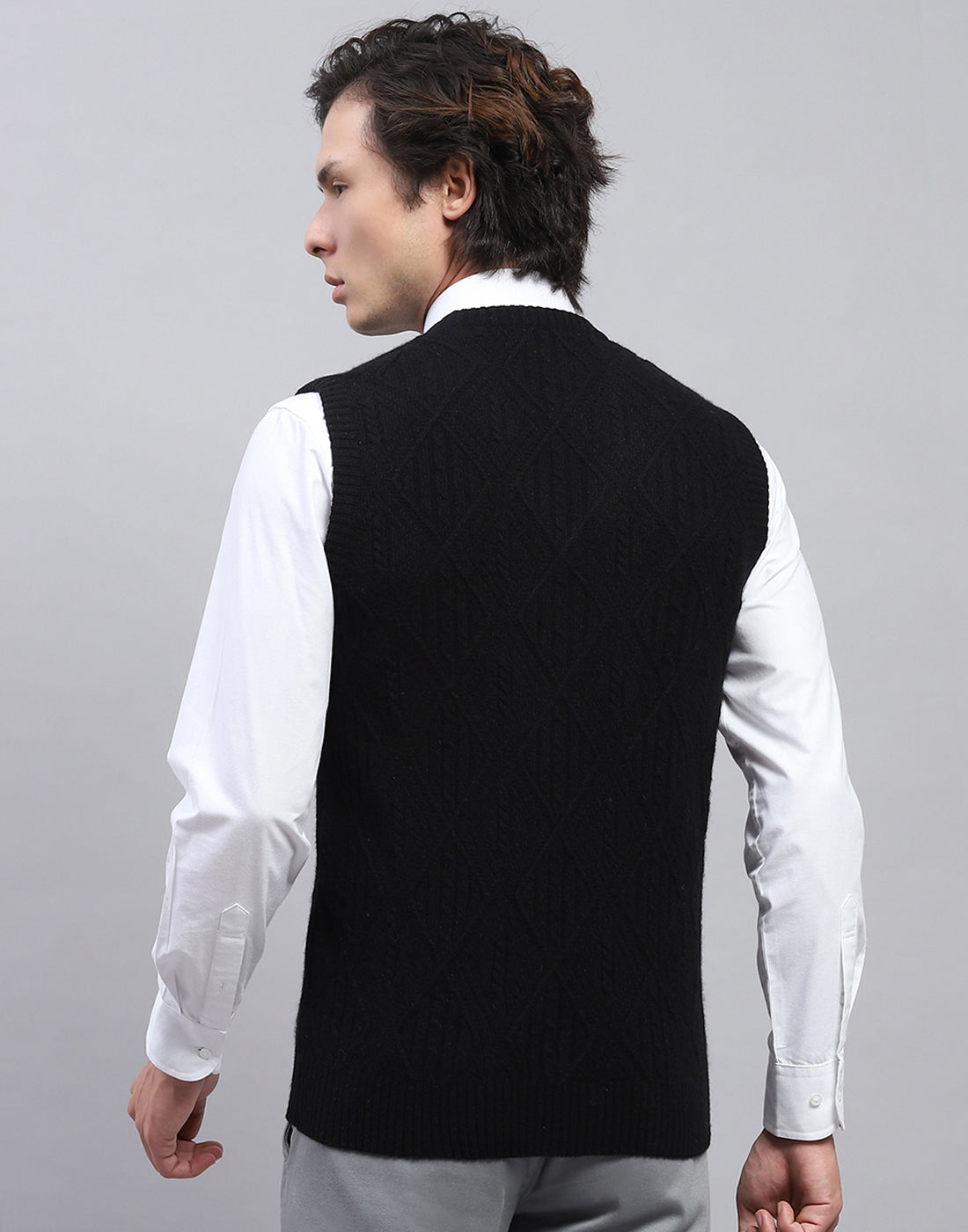 Men Black Self Design V Neck Sleeveless Sweater