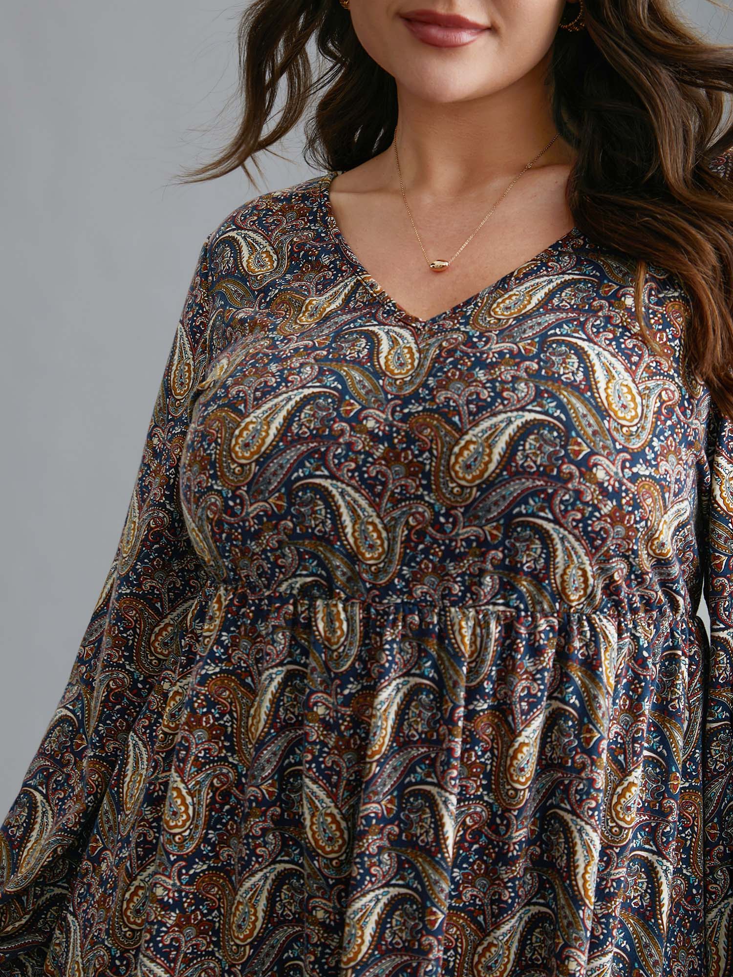 Perris Pattern V-Neck Waist-Cinching Knit Top