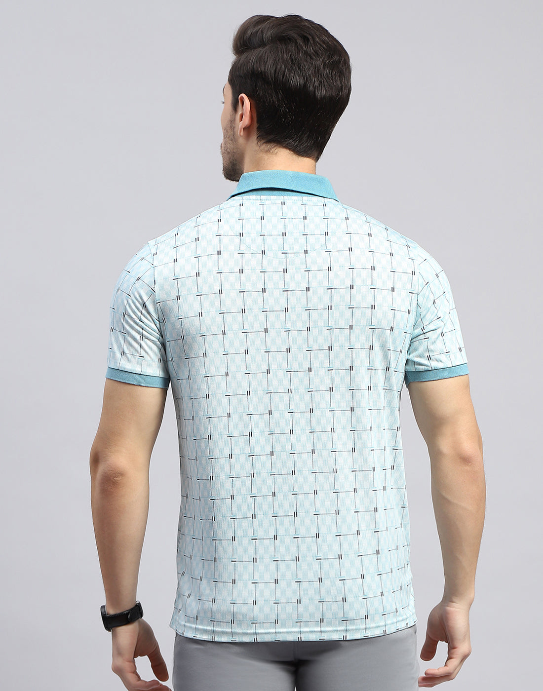 Men Sky Blue Self Design Polo Collar Half Sleeve T-Shirt